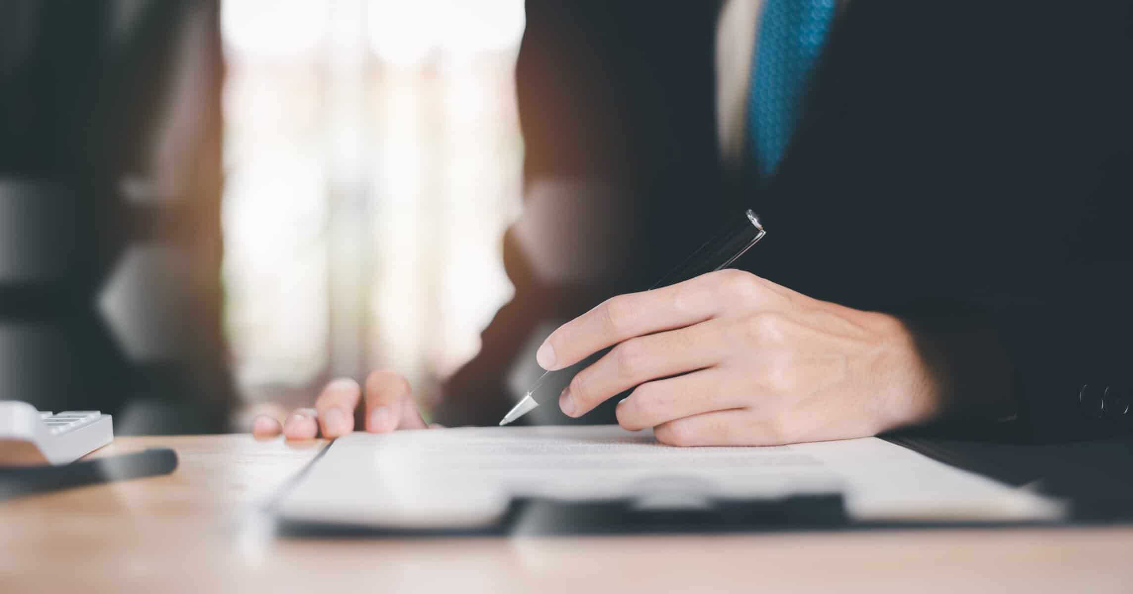 Florida homeowner reviewing a Quit Claim Deed with a St. Augustine real estate attorney